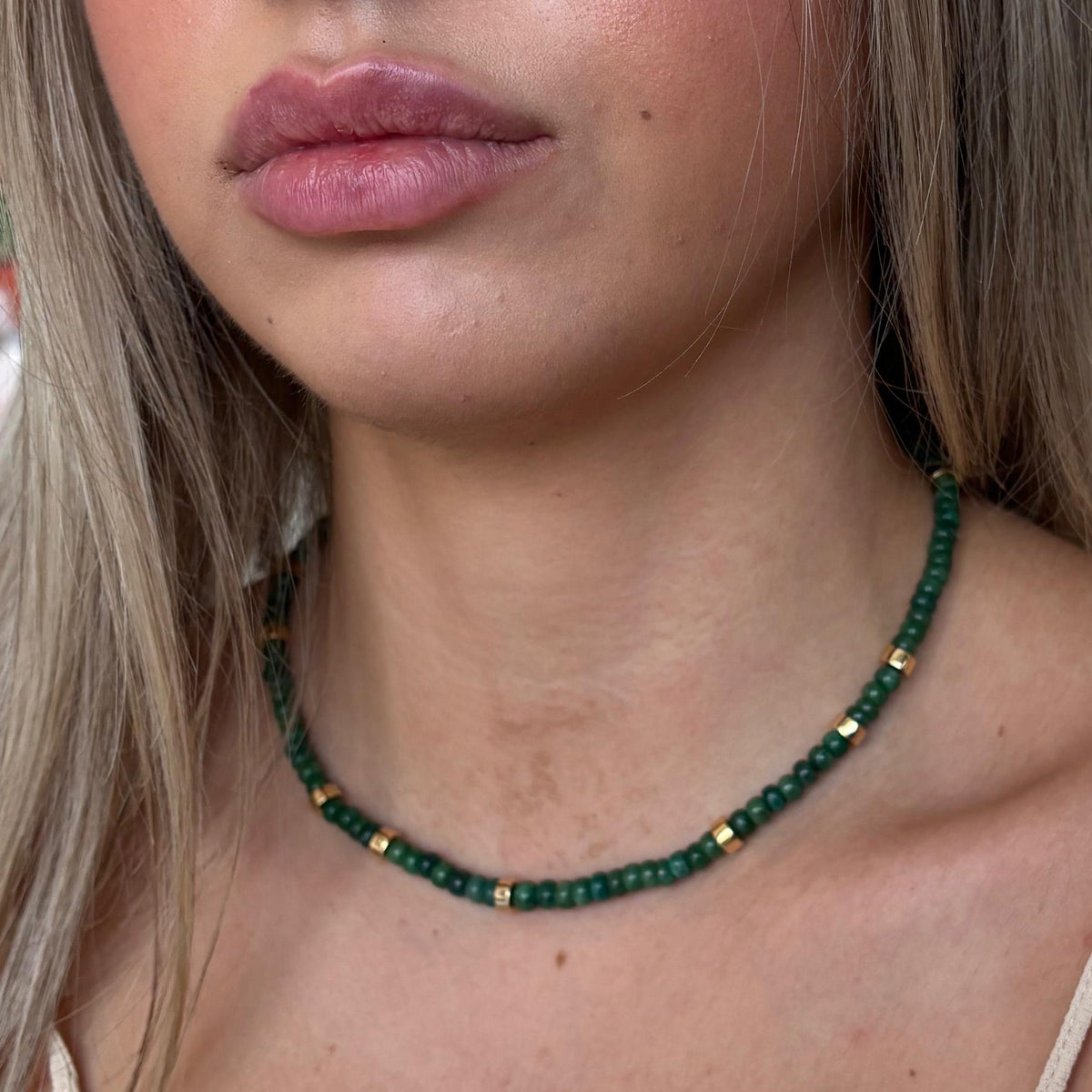 The Emerald with Gold Cylinders necklace